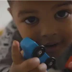 toddler playing with toys from startup video production by Vermillion Films - Video Production Birmingham